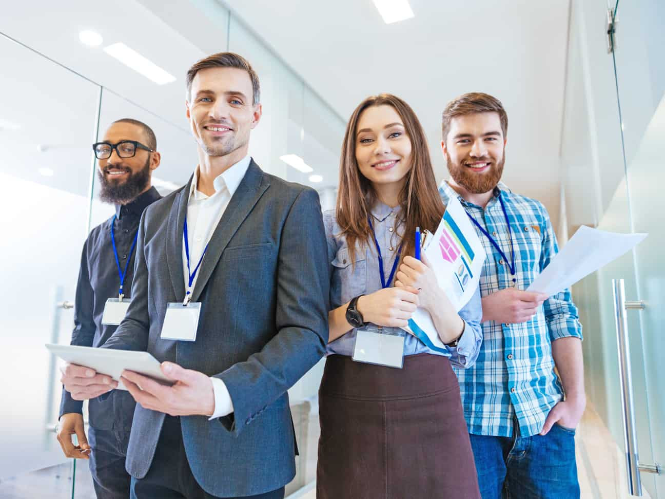 Healthcare operations professionals collaborating in a modern workplace to support revenue cycle management and organizational performance