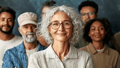 Diverse group of professionals standing together, representing inclusive leadership, workforce diversity, and organizational culture.