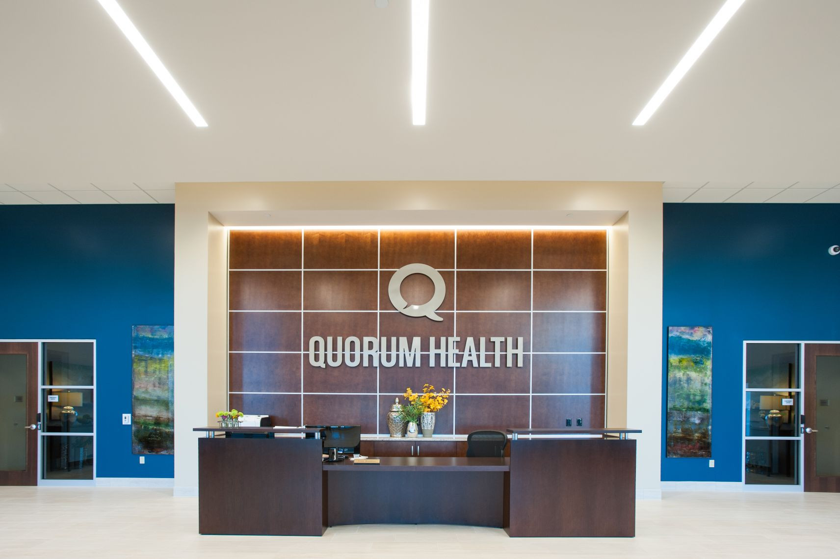 Quorum Health facility reception area showcasing a modern healthcare organization focused on operational excellence and patient services.