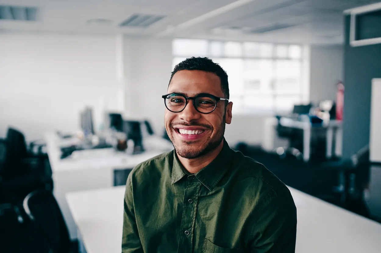 Professional employee in a modern office environment supporting healthcare operations, revenue cycle performance, and business success