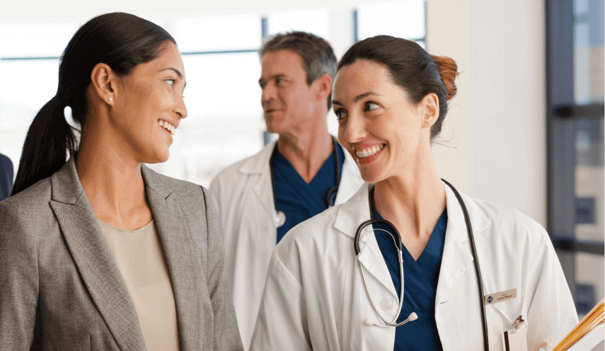 Business women and doctor talking
